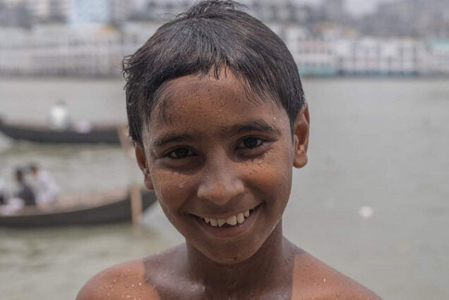 Portrait photo of a Child at Buriganga River area during our Dhaka Photography Tour